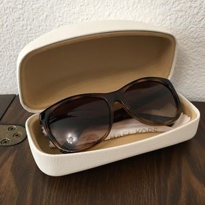 Michael Kors tortoise shell sunglasses.